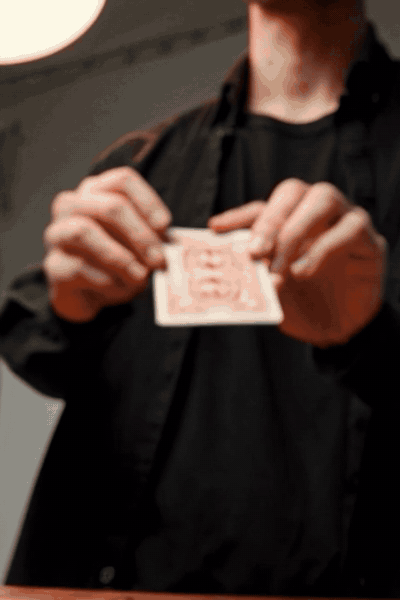 Close-up demonstration of the reading marks in the card back pattern
